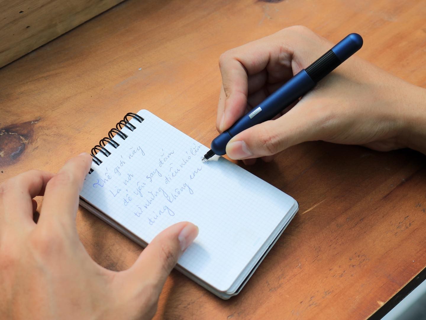 Lamy-pico-ballpoint-pen-but-bi-imperial-blue-on-hand